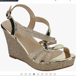 Size 7 Brand new in box gold wedges from Amazon